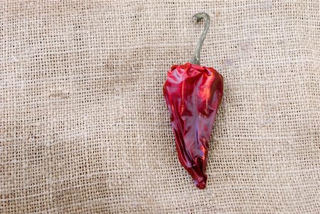 simsearch:400-03990114,k - Hot red dry pepper on a huckaback background Photographie de stock - Aubaine LD & Abonnement, Code: 400-03965634