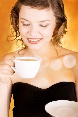 simsearch:400-03965656,k - glamorous girl having a cup of coffee Photographie de stock - Aubaine LD & Abonnement, Code: 400-03965655