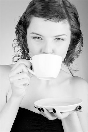simsearch:400-03965656,k - glamorous girl having a cup of coffee Photographie de stock - Aubaine LD & Abonnement, Code: 400-03965658