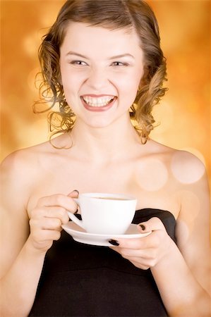 simsearch:400-03965656,k - glamorous girl having a cup of coffee Photographie de stock - Aubaine LD & Abonnement, Code: 400-03965652