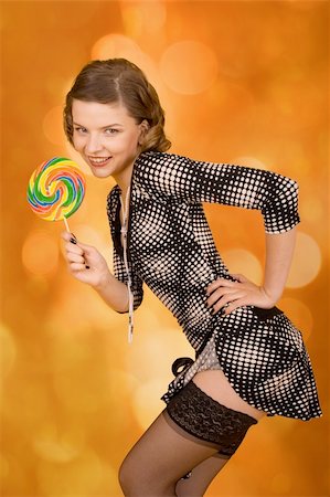 simsearch:400-03965656,k - fashion girl with a rainbow lollipop Photographie de stock - Aubaine LD & Abonnement, Code: 400-03965667