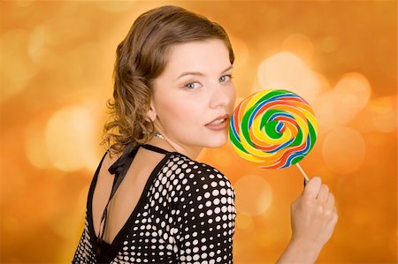 simsearch:400-03965656,k - fashion girl with a rainbow lollipop Photographie de stock - Aubaine LD & Abonnement, Code: 400-03965669