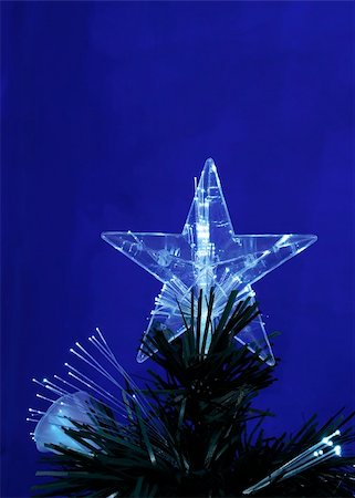 simsearch:400-04736001,k - Details of a fibre-optic decorated Christmas Tree against a red wall Foto de stock - Super Valor sin royalties y Suscripción, Código: 400-03965887