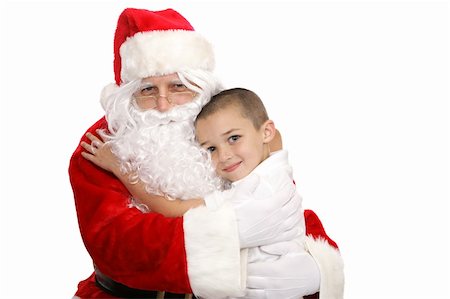 simsearch:400-04636742,k - Adorable little boy giving Santa Claus a hug.  Isolated on white. Foto de stock - Royalty-Free Super Valor e Assinatura, Número: 400-03966852