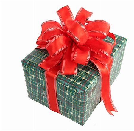 simsearch:400-03961239,k - A green wrapped Christmas gift with a red bow, isolated with room for text. Photographie de stock - Aubaine LD & Abonnement, Code: 400-03967050