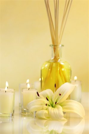 simsearch:400-03950235,k - Scented sticks with candles and lily on pale background Photographie de stock - Aubaine LD & Abonnement, Code: 400-03967119