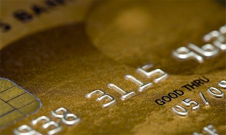simsearch:695-03386967,k - Cloe up of a golden credit card Stock Photo - Budget Royalty-Free & Subscription, Code: 400-03967223