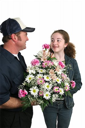 florist background - A cute teen girl accepting a bouquet of flowers from a delivery man.  Vertical orientation - isolated. Photographie de stock - Aubaine LD & Abonnement, Code: 400-03967377