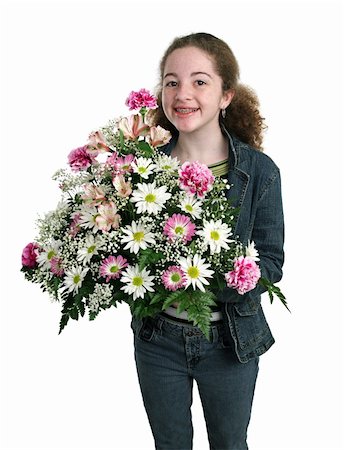 simsearch:400-03967457,k - A happy teen girl holding a big bouquet of flowers.  Isolated. Foto de stock - Royalty-Free Super Valor e Assinatura, Número: 400-03967382