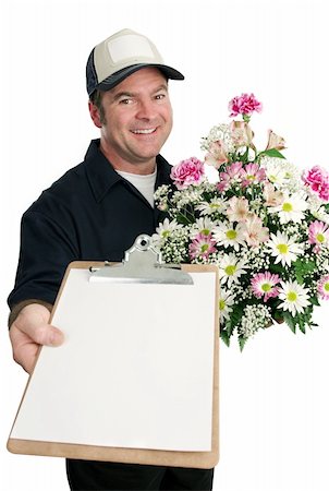 simsearch:400-04486211,k - A friendly delivery man bringing flowers and waiting for a signature. Stockbilder - Microstock & Abonnement, Bildnummer: 400-03967445