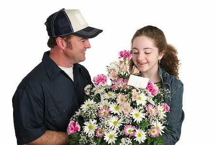 simsearch:400-04486211,k - A cute teen girl receiving flowers unexpectedly. Isolated. Stockbilder - Microstock & Abonnement, Bildnummer: 400-03967457