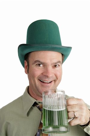 An Irish American man excited about his green beer on St. Patrick's Day.  Isolated on white. Stock Photo - Budget Royalty-Free & Subscription, Code: 400-03967452