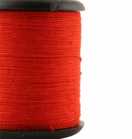 simsearch:649-06433365,k - Red spool of thread over white Photographie de stock - Aubaine LD & Abonnement, Code: 400-03967766