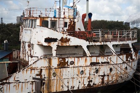 simsearch:614-05792476,k - Abandoned ship in the harbor of IJmuiden, the Netherlands Stock Photo - Budget Royalty-Free & Subscription, Code: 400-03967885