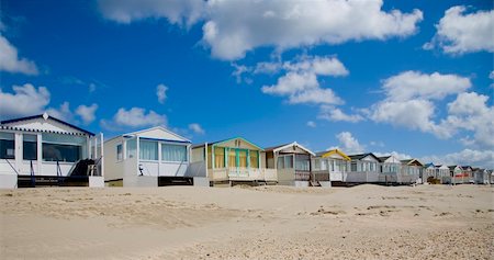 Beachs huts in a row by IJmuiden, the Netherlands Stock Photo - Budget Royalty-Free & Subscription, Code: 400-03967883