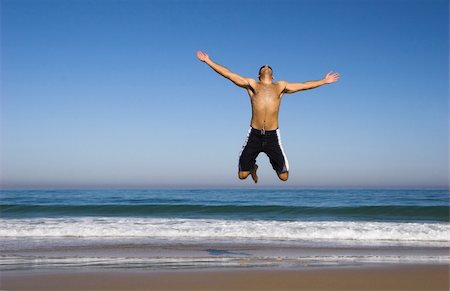 simsearch:400-04450996,k - Man running and jumping on the beach Stock Photo - Budget Royalty-Free & Subscription, Code: 400-03968272