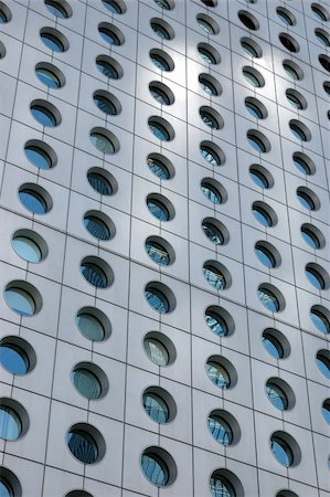 Circular windows of an office building in Hong Kong Stock Photo - Budget Royalty-Free & Subscription, Code: 400-03968665