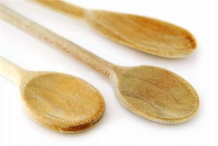 Old wooden cooking spoons isolated on white background Stock Photo - Budget Royalty-Free & Subscription, Code: 400-03968765