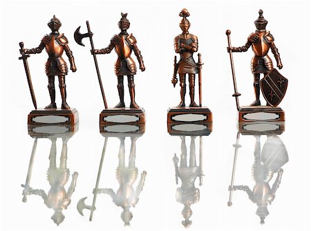 scudo - four figures of knights isolated on white Fotografie stock - Microstock e Abbonamento, Codice: 400-03969080
