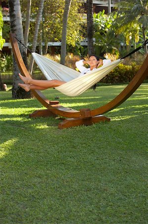 simsearch:400-03969202,k - 20-25 years woman portrait ralaxing on hammock at exotic surrounding, bali indonesia Foto de stock - Royalty-Free Super Valor e Assinatura, Número: 400-03969097