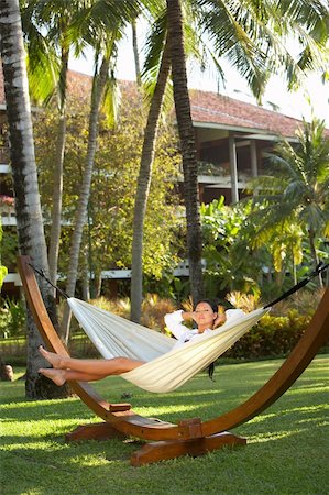 simsearch:400-03969202,k - 20-25 years woman portrait ralaxing on hammock at exotic surrounding, bali indonesia Foto de stock - Royalty-Free Super Valor e Assinatura, Número: 400-03969098