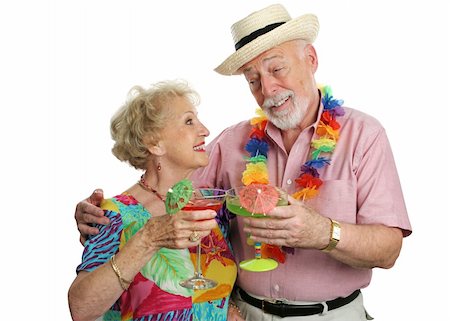 simsearch:400-08040653,k - An attractive elderly couple enjoying cocktails on a tropical vacation. Stock Photo - Budget Royalty-Free & Subscription, Code: 400-03969132