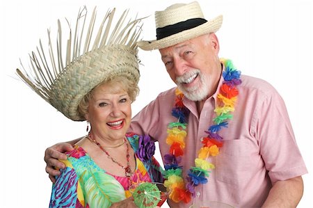 simsearch:400-08040653,k - An attractive elderly couple on a tropical vacation, laughing together.  Isolated Stock Photo - Budget Royalty-Free & Subscription, Code: 400-03969234