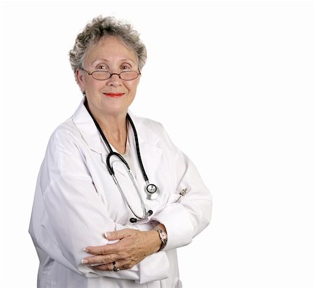 A mature, competent looking female doctor isolated on white. Stock Photo - Budget Royalty-Free & Subscription, Code: 400-03969254