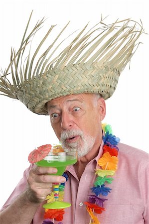simsearch:400-03969432,k - A senior on a tropical vacation, very excited about a margarita. Stock Photo - Budget Royalty-Free & Subscription, Code: 400-03969263