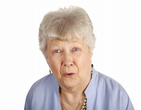 sad grandmother - A pretty senior woman looking sad and upset.  Isolated on white. Stock Photo - Budget Royalty-Free & Subscription, Code: 400-03969305