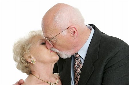 simsearch:400-03969319,k - A senior husband and wife locked in a romantic kiss. Stock Photo - Budget Royalty-Free & Subscription, Code: 400-03969303