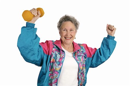 senior lifting dumbbell - A senior lady excited over meeting her fitness goals.  Isolated on white. Stock Photo - Budget Royalty-Free & Subscription, Code: 400-03969337