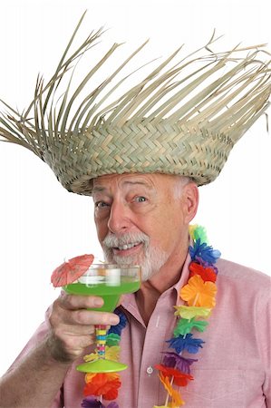 simsearch:400-03969432,k - A senior man on a tropical vacation enjoying a margarita. Stock Photo - Budget Royalty-Free & Subscription, Code: 400-03969363