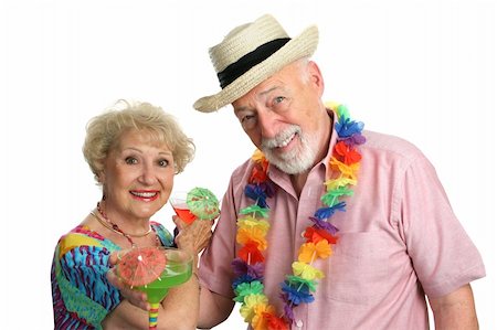 simsearch:400-08040653,k - An attractive elderly couple on a tropical vacation, drinking cocktails. Stock Photo - Budget Royalty-Free & Subscription, Code: 400-03969465