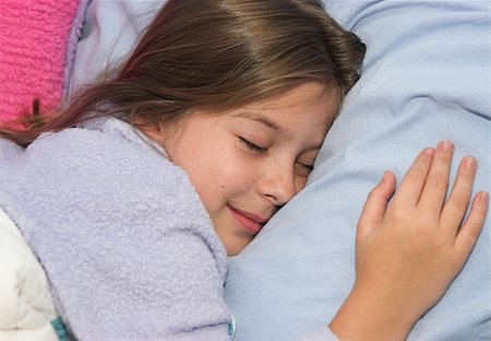 a pretty little girl, sound asleep in bed Stock Photo - Budget Royalty-Free & Subscription, Code: 400-03969790