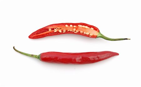 simsearch:700-00643990,k - Cutted Red hot chili peppers in isolated white background Stock Photo - Budget Royalty-Free & Subscription, Code: 400-03969873
