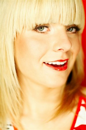 simsearch:614-00684036,k - Portrait of beautiful young smiling woman with red lipstick Stockbilder - Microstock & Abonnement, Bildnummer: 400-03960200