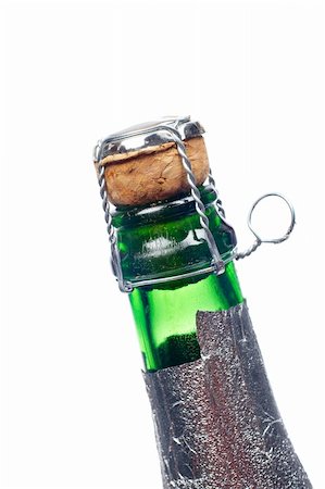 simsearch:400-03947879,k - Detail of champagne cork over a white background Stock Photo - Budget Royalty-Free & Subscription, Code: 400-03960451
