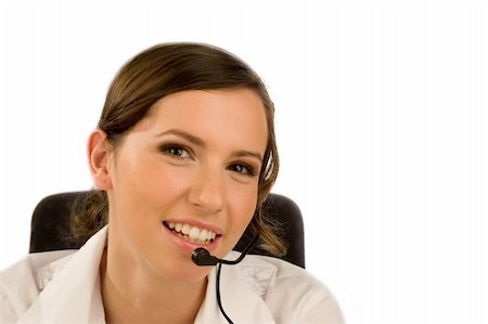 simsearch:400-03943051,k - Beautiful smiling woman with headset isolated on white Stock Photo - Budget Royalty-Free & Subscription, Code: 400-03960532