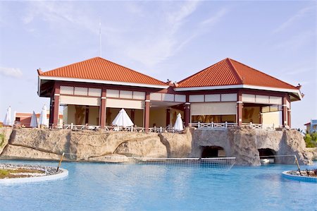 simsearch:862-08273009,k - Caribbean holidays swimming pool & restaurant Photographie de stock - Aubaine LD & Abonnement, Code: 400-03960557