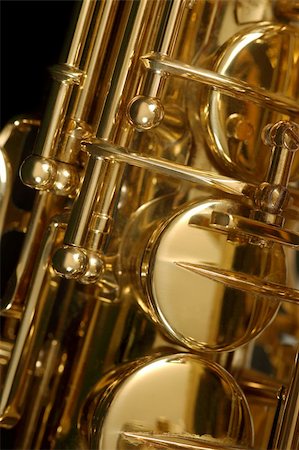 Macro image of the valves and keys of a saxophone. Foto de stock - Super Valor sin royalties y Suscripción, Código: 400-03960574