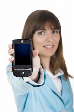 simsearch:400-04434095,k - Beautiful businesswoman holding a PDA over a white background (This file include a Path on the pda screan) Photographie de stock - Aubaine LD & Abonnement, Code: 400-03960888