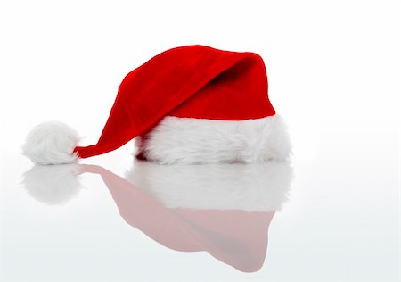 simsearch:400-03960871,k - A red santa hat isolated on white background Stockbilder - Microstock & Abonnement, Bildnummer: 400-03960882