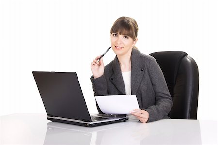 simsearch:632-01157433,k - Beautiful business woman working with a laptop on a white background Stock Photo - Budget Royalty-Free & Subscription, Code: 400-03960897