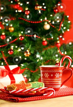 snow writing - Christmas cookies  near the Christmas tree with candycanes Stock Photo - Budget Royalty-Free & Subscription, Code: 400-03961228