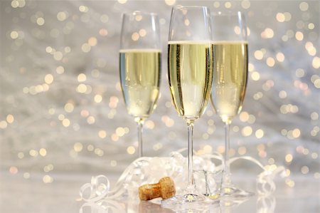 simsearch:400-04288408,k - Threes glasses of champagne with silver background Stock Photo - Budget Royalty-Free & Subscription, Code: 400-03961242