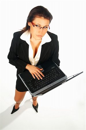 Sexy Business women isolated on white holding laptop computer Photographie de stock - Aubaine LD & Abonnement, Code: 400-03961564