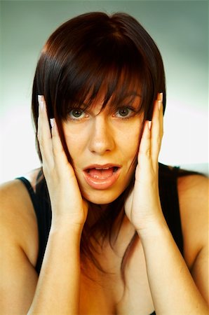 simsearch:400-05069351,k - Emotions Brunette Portrait close up Stock Photo - Budget Royalty-Free & Subscription, Code: 400-03962765