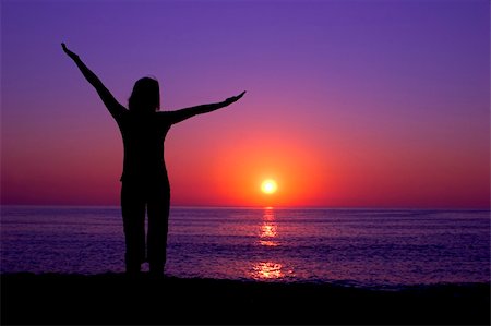 simsearch:400-03925229,k - Woman silhouette at the sunset on a beautiful end of the day Stock Photo - Budget Royalty-Free & Subscription, Code: 400-03962903