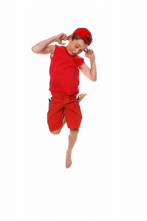 A boy dancing or hopping up and down and making faces. Stock Photo - Budget Royalty-Free & Subscription, Code: 400-03963006